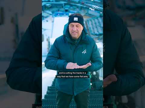 Why does this huge machine need to be pushed over the ski jump in-run before competition?