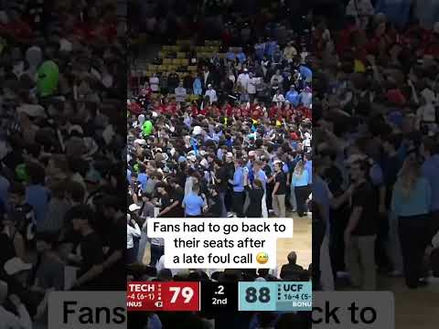 Oops! UCF fans ushered off after early court storming 😅