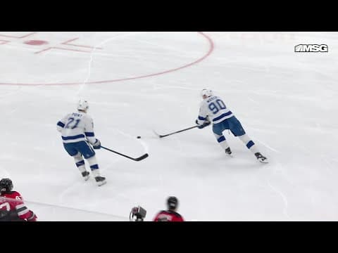 Brayden Point scores a goal against the New Jersey Devils
