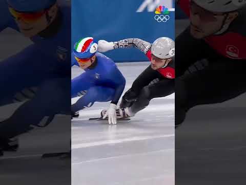 SCENES at the finish in speed skating as Sighel slides backwards across the finish line. 😱