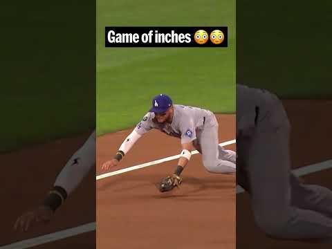 Miguel Rojas JUST beats Trea Turner to the bag 😳