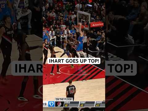 Ihart goes up for the big 1 handed slam