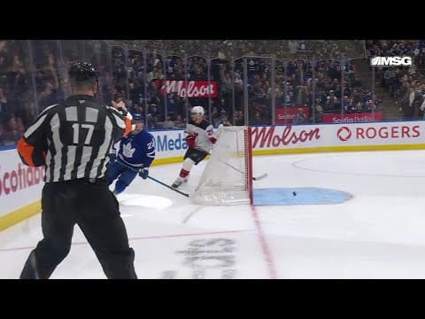 Matthew Knies scores a goal against the New Jersey Devils