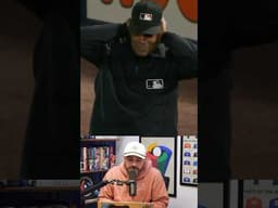 Yankees fans boo the umpire after he realized the net was too high to throw a ball over, a breakdown