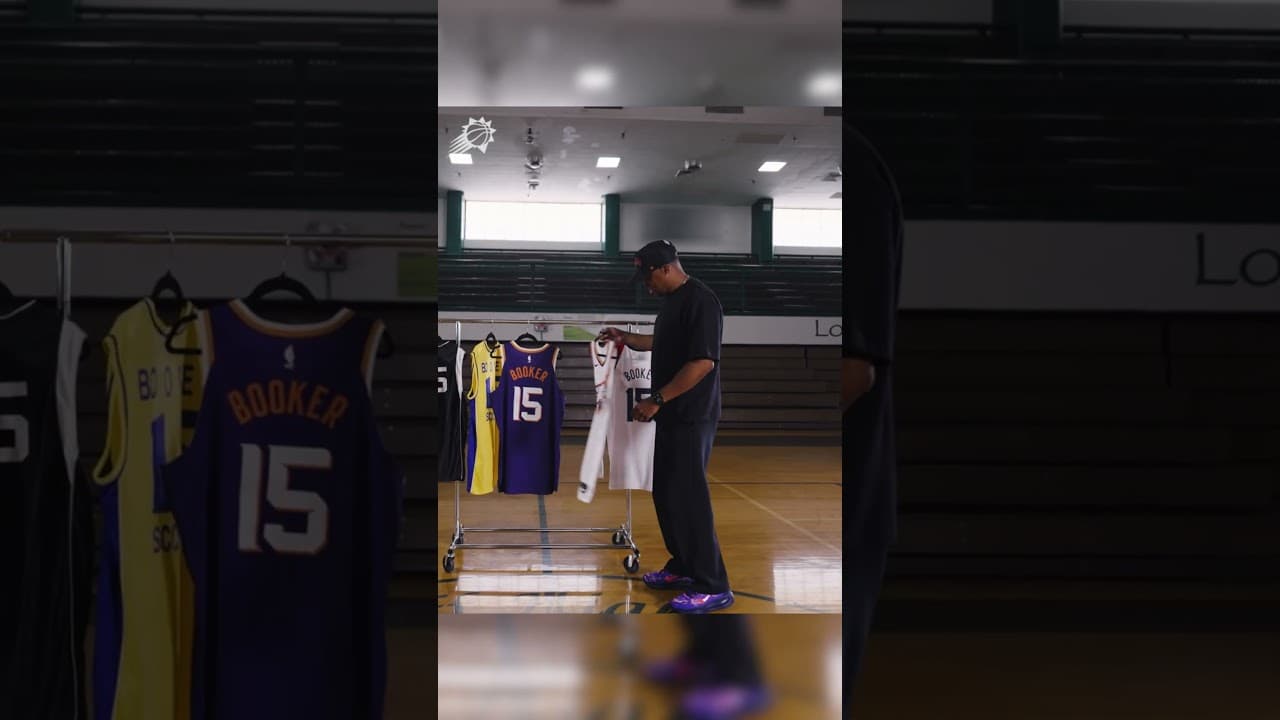 Book gives his dad a first-look at his new jersey number 💜🥹