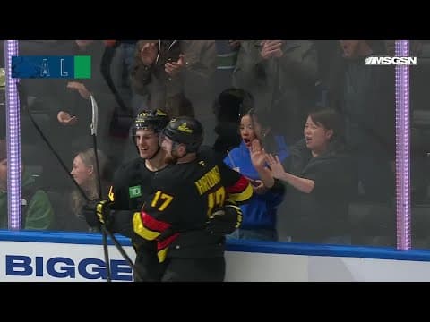 Zeev Buium scores a goal against the New Jersey Devils