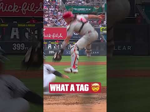 J.T. Realmuto applies the mid-air tag at home! 🤯