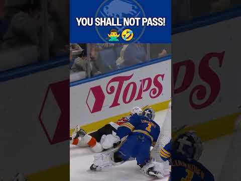 Stopping pucks AND players! 🤣