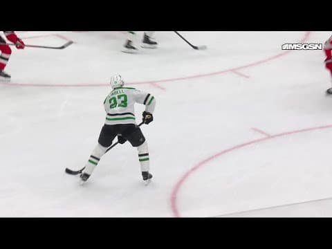 Jason Robertson scores a goal against the New Jersey Devils