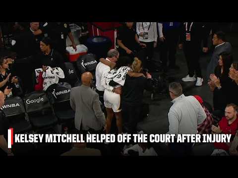 Kelsey Mitchell is helped off the court after appearing to sustain a leg injury | WNBA on ESPN