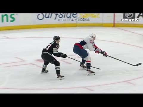 Dylan Strome scores a goal against the New Jersey Devils