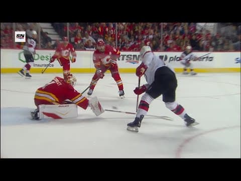 Simon Nemec scores a goal against the Calgary Flames