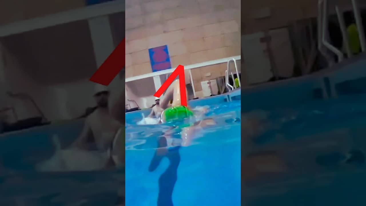 Let the hand travel slightly wider over the water so the shoulder stays relaxed...