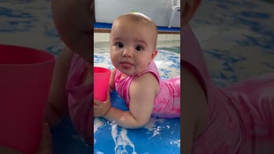 Baby Swimming Is A Sensory Experience #babyswimming #babyshorts #learntoswim #sensory #swim #pool