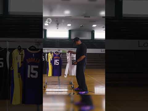 Book gives his dad a first-look at his new jersey number 💜🥹