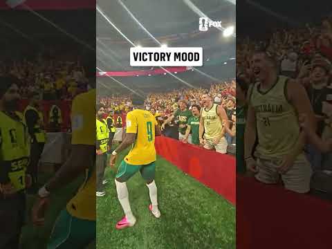 Mohamed Touré celebrating with the Australians in Canada